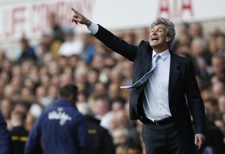 Manchester City's manager Manuel Pellegrini gestures during the English Premier League football match against Tottenham Hotspur in north London on May 3, 2015