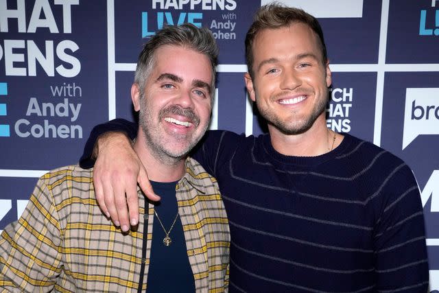 <p>Charles Sykes/Bravo</p> Colton Underwood (right) and husband Jordan C. Brown