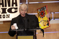 FILE - In this Sept. 11, 2019 file photo, John Prine accepts the Album of the Year award at the Americana Honors & Awards show in Nashville, Tenn. Prine died Tuesday, April 7, 2020, from complications of the coronavirus. He was 73. (AP Photo/Wade Payne, File)