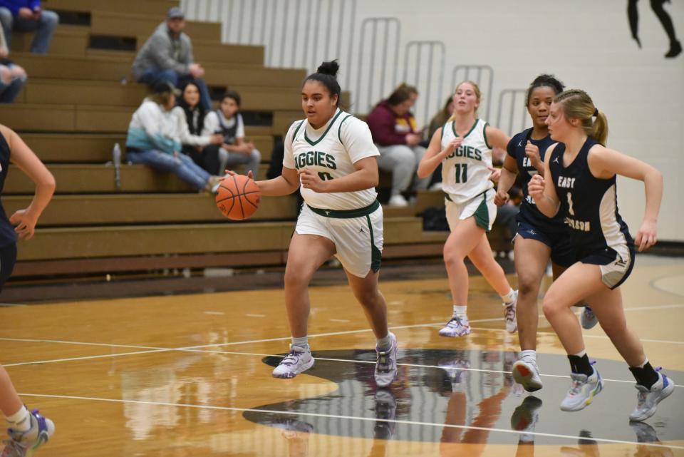 Sand Creek's Emily Carbajal dribbles up the floor against East Jackson on Wednesday, December 28, 2022 at Adrian College.