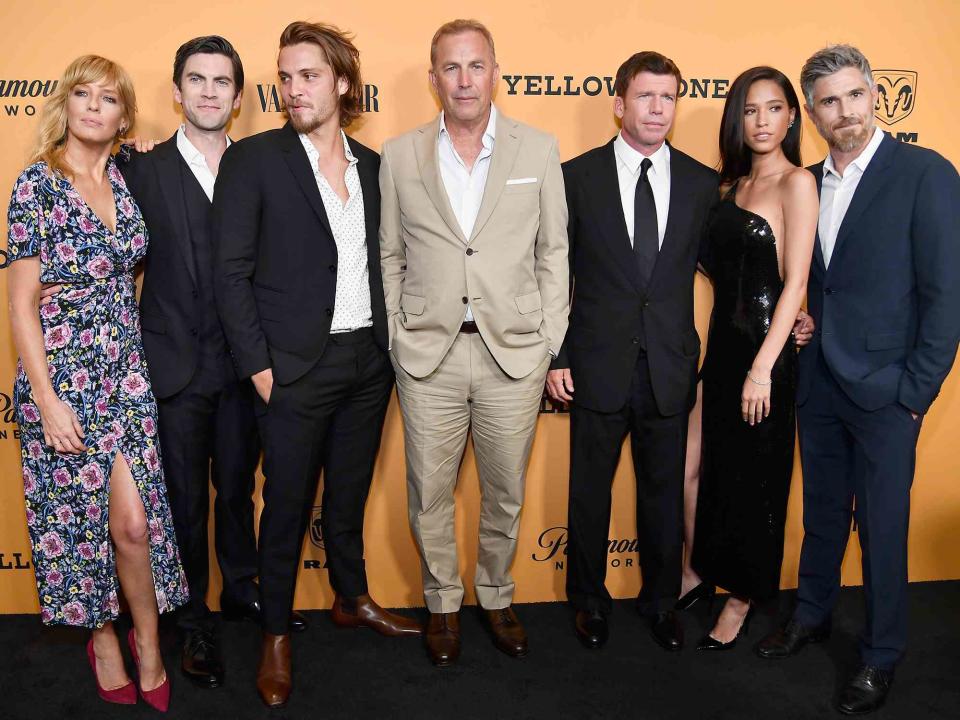 <p>Frazer Harrison/Getty</p> Kelly Reilly, Wes Bentley, Luke Grimes, Kevin Costner, Taylor Sheridan, Kelsey Asbille and Dave Annable attend 