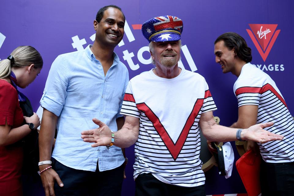 Virgin Voyages' CCO Nirmal Saverimuttu (left) and Virgin Group founder Sir Richard Branson (right) are seen during an announcement at Pitt Street Mall in Sydney, Tuesday, November 12, 2019. (AAP Image/Bianca De Marchi) NO ARCHIVING ** STRICTLY EDITORIAL USE ONLY **