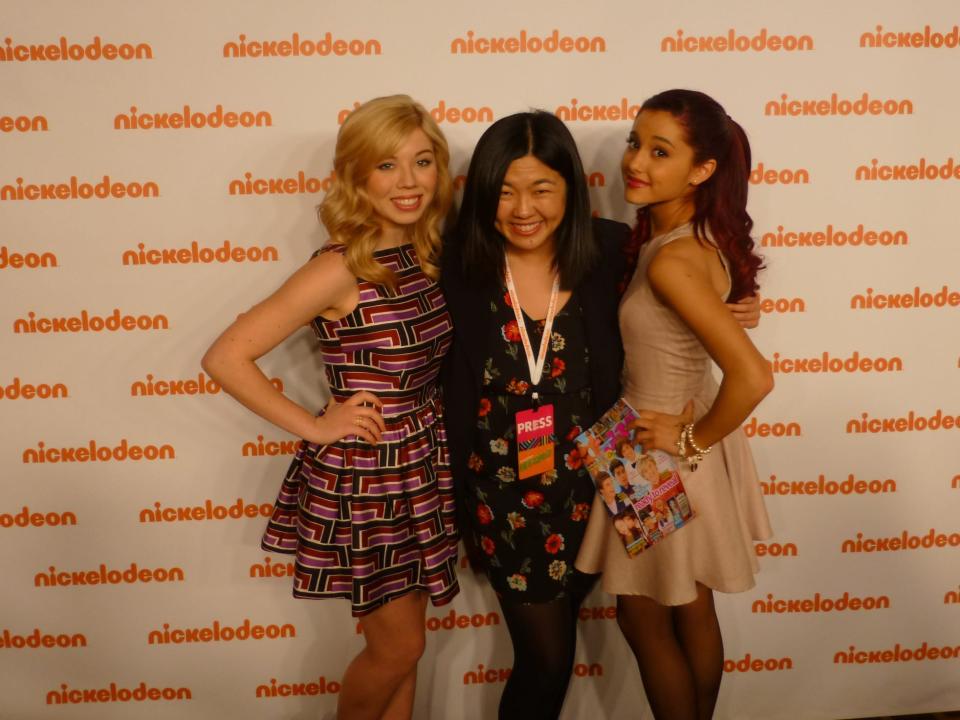 Author Rachel Chang with Jennette McCurdy and Ariana Grande in front of Nickelodeon backdrop