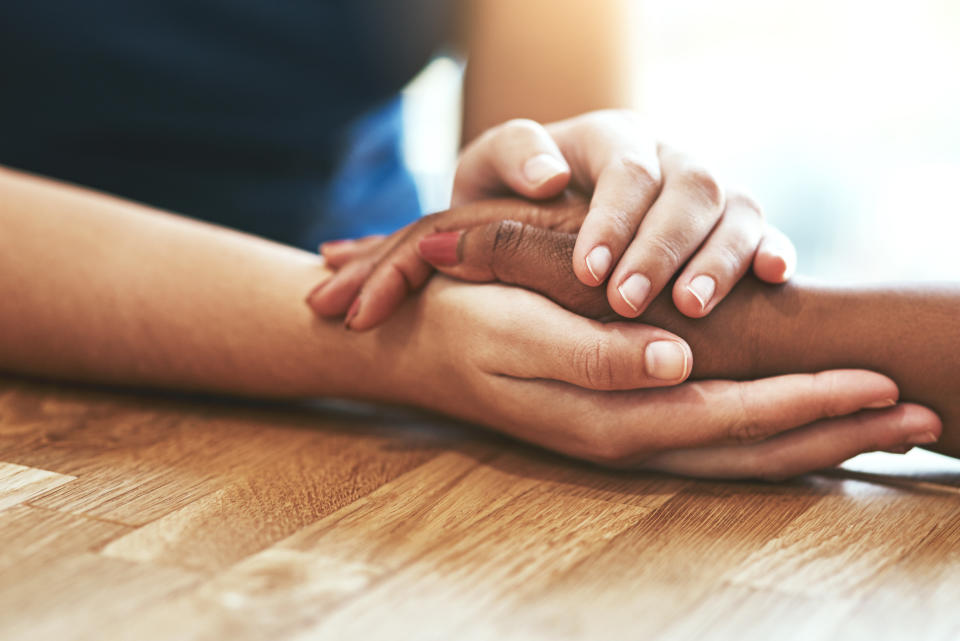 &ldquo;Your response has the power to show them that it&rsquo;s safe to open up to people or that it&rsquo;s better to stay quiet," says trauma therapist Tovah Means. (Photo: PeopleImages via Getty Images)