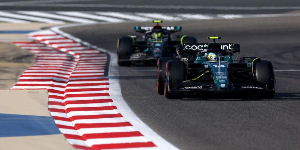 bahrain, bahrain march 03 fernando alonso of spain driving the 14 aston martin amr23 mercedes leads lewis hamilton of great britain driving the 44 mercedes amg petronas f1 team w14 during practice ahead of the f1 grand prix of bahrain at bahrain international circuit on march 03, 2023 in bahrain, bahrain photo by lars barongetty images