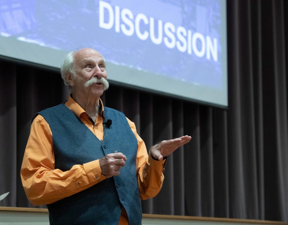 Walkability expert Dan Burden shares his thoughts on improving pedestrian and biking safety in Pensacola during the CivicCon lecture series at the Brownsville Community Center on Monday, April 17, 2023. 