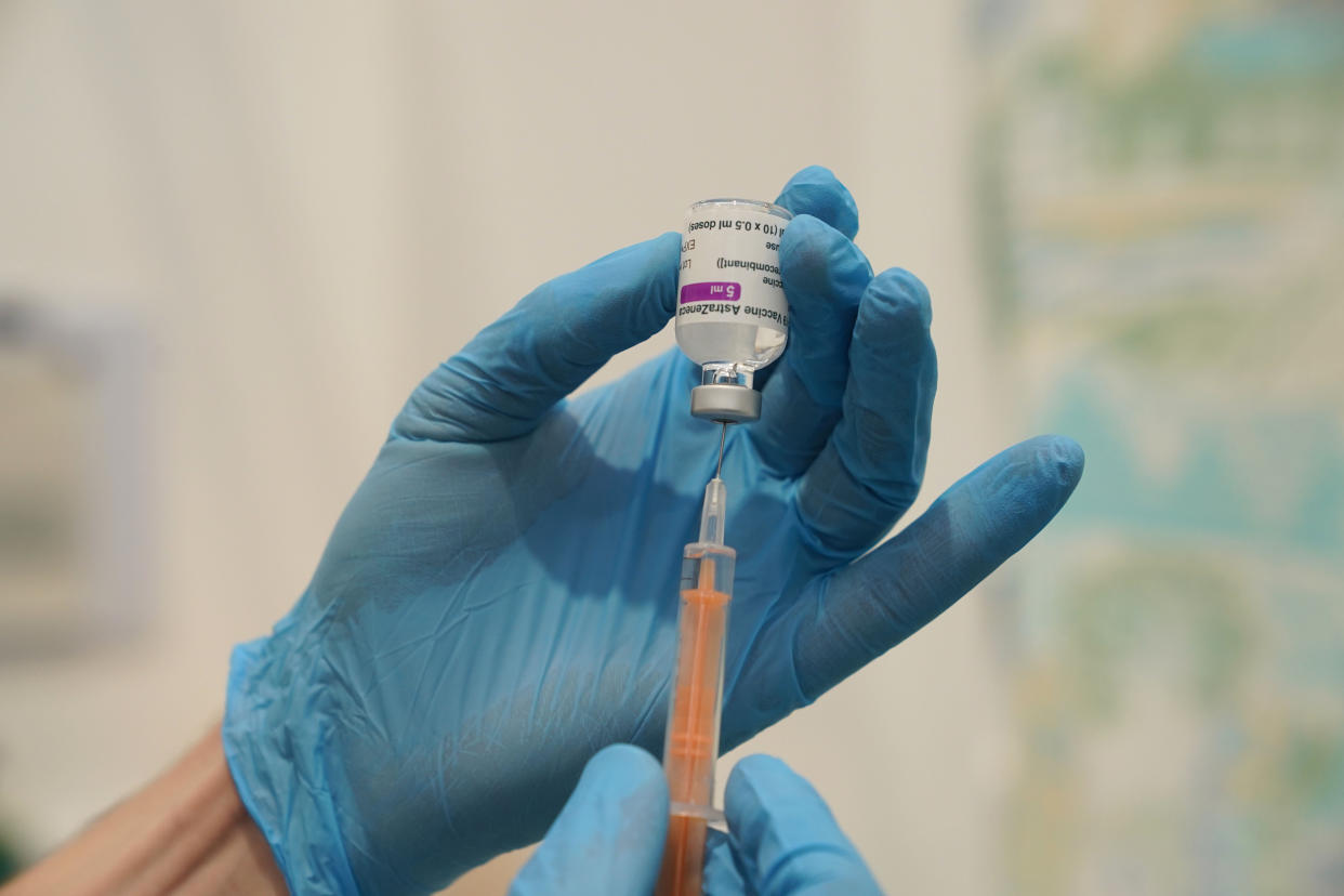 A member of staff prepares a dose of the Oxford/Astrazeneca coronavirus vaccine at a coronavirus vaccination clinic at the NHS Nightingale Hospital North East in Sunderland. Picture date: Tuesday January 26, 2021.