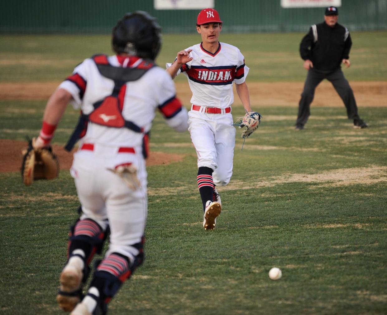 Jim Ned's Blaine Palmer fields a bunt against Wall.