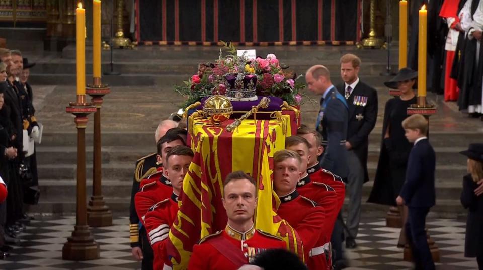 The Queen’s coffin being carried in Westminster Abbey (Reuters)