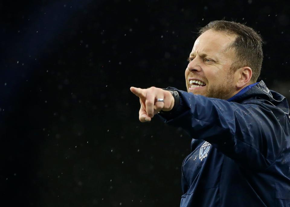 Vancouver Whitecaps head coach Marc Dos Santos shouts from the bench during the first half of an MLS soccer match against the New England Revolution, Wednesday, July 17, 2019, in Foxborough, Mass. The Revolution won 4-0. (AP Photo/Steven Senne)