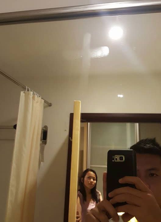 The cross that was drawn on two friends hotel mirror after watching the horror movie. Photo: Facebook