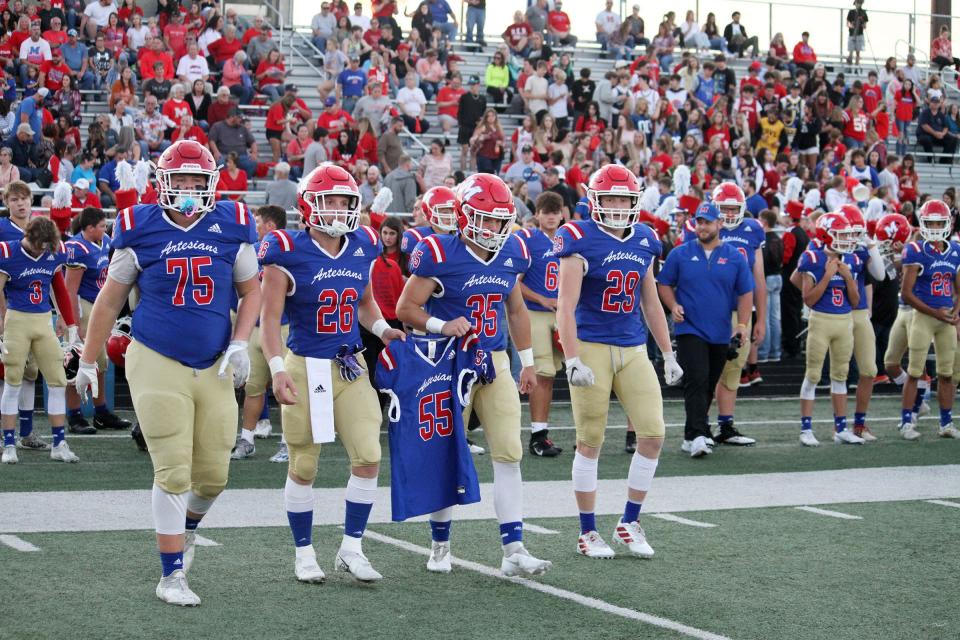 Martinsville brought out the jersey number of Gunner Burnam to the coin toss before Friday's senior night game against Mooresville. Burnam passed away from cancer in the middle school and this year would've been his senior season.