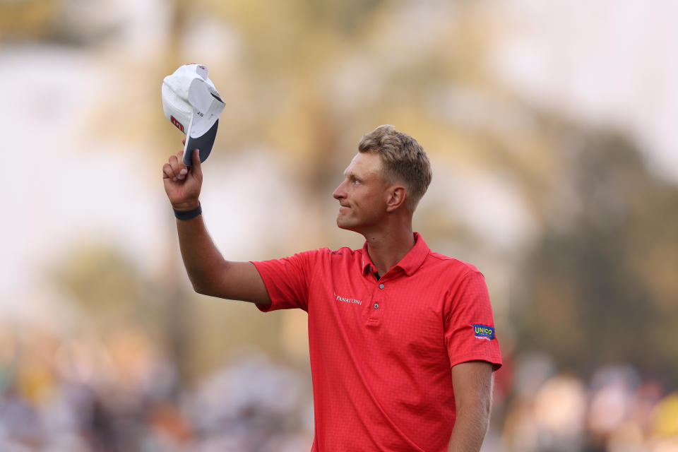 Adrian Meronk of Poland reacts to finishing his round on the 18th green during the final round of the Hero Dubai Desert Classic at Emirates Golf Club on January 21, 2024, in Dubai, United Arab Emirates. (Photo by Richard Heathcote/Getty Images)