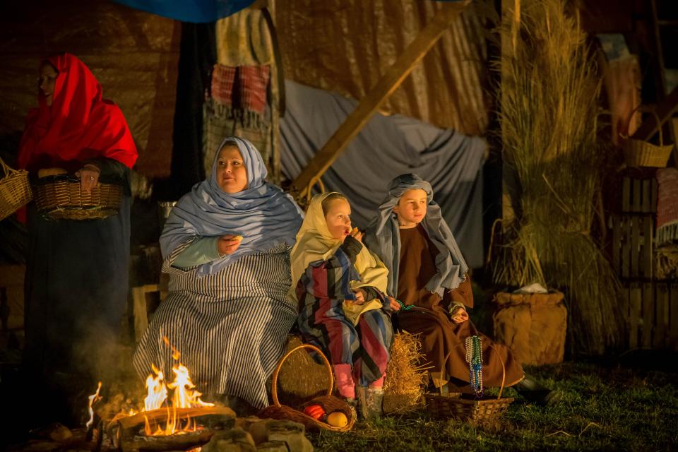 Members of the Coshocton Christian Tabernacle play various rules in depicting the birth, life, death and resurrection of Jesus Christ in a drive-thru nativity that is in its 24th year.