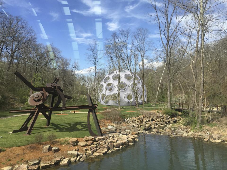 This computer illustration provided by the Crystal Bridges Museum of American Art on Dec. 28, 2016, shows a rendering of how inventor Buckminster Fuller's Fly's Eye Dome will look when installed on museum grounds in Bentonville, Ark. The museum recently told its patrons it intends to construct the futuristic dome in the summer of 2017. (Jessi Mueller/Crystal Bridges Museum of American Art via AP)