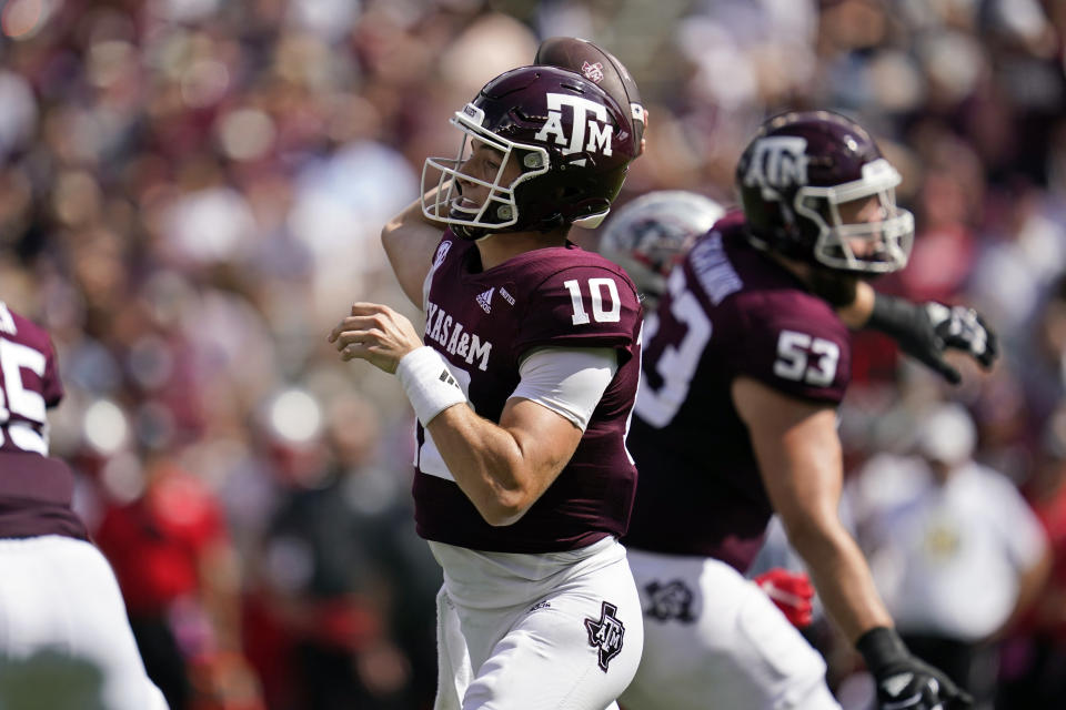Texas A&M quarterback Zach Calzada (10) pass down field against New Mexico during the first half of an NCAA college football game on Saturday, Sept. 18, 2021, in College Station, Texas. (AP Photo/Sam Craft)