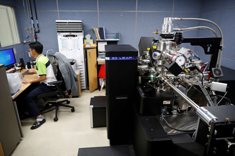 An employee works beside the Atom Probe Tomography at National Nanofab Center in Daejeon