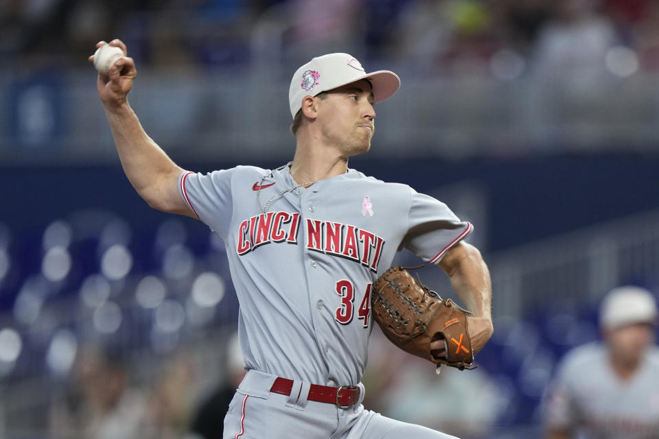 Cincinnati Reds' Luke Weaver delivers a pitch during the first inning of a baseball game against the Miami Marlins, Sunday, May 14, 2023, in Miami. (AP Photo/Wilfredo Lee)