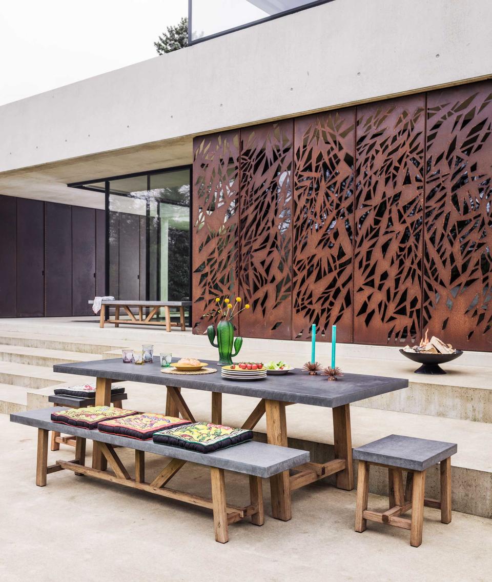 <p> If you&apos;re looking to zone up your space, block lacklustre views, or create a more private and sheltered nook, then a sturdy screen is definitely a good addition to your garden design ideas.&#xA0; </p> <p> This Corten steel one is an absolute head-turner, providing the perfect backdrop for a sleek seating area. Against the pared-down surroundings, it&apos;s a bold and beautiful focal point and really completes the scene. </p> <p> Of course, there are plenty of other options if you prefer something a little more understated.&#xA0; </p>