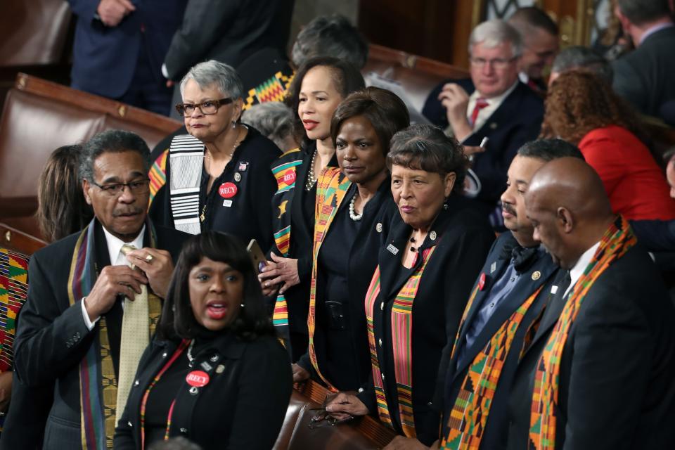 Members of Congressional Black Caucus wear black clothing and Kente cloth ahead of a State of the Union address in the chamber of the House of Representatives in Washington, D.C., on January 30, 2018.