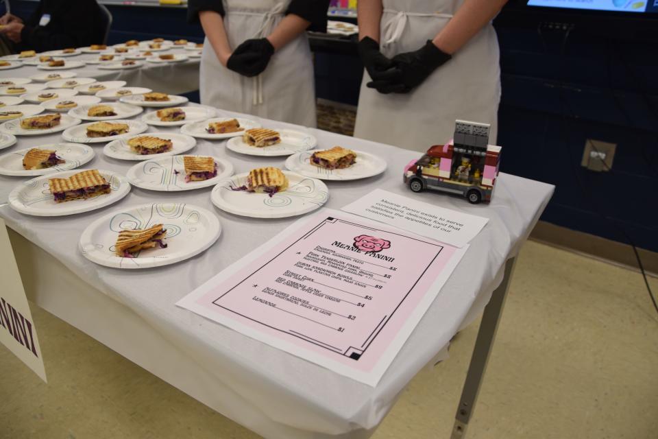 For the Food Truck Wars, students are required to make a complete menu and mission statement for their trucks. Some teams came with Lego trucks while others had drawings of their truck designs.