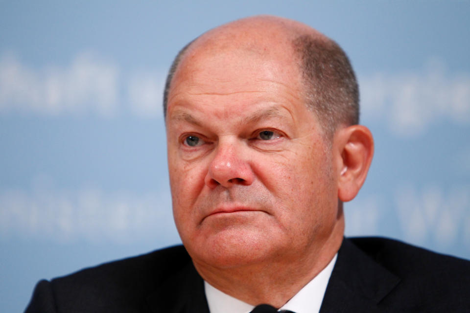 Germany's Finance Minister Olaf Scholz attends a news conference after Chancellor Angela Merkel and state premiers reached an agreement with the regions most affected by the planned brown coal exit, in Berlin, Germany, January 16, 2020. REUTERS/Michele Tantussi