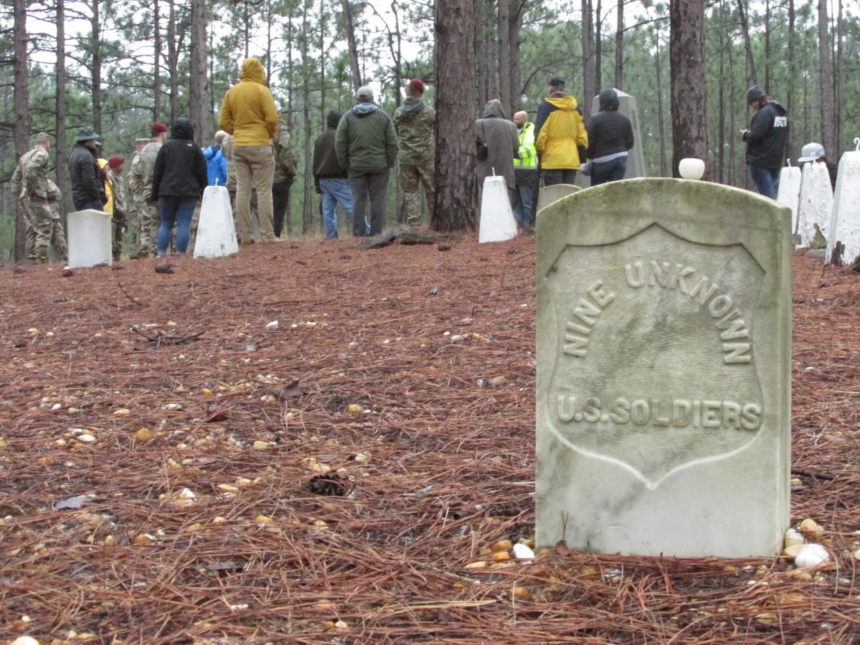 A guided tour visits the Civil War Monroe's Crossroads battlefield site March 10, 2023, on Fort Bragg.