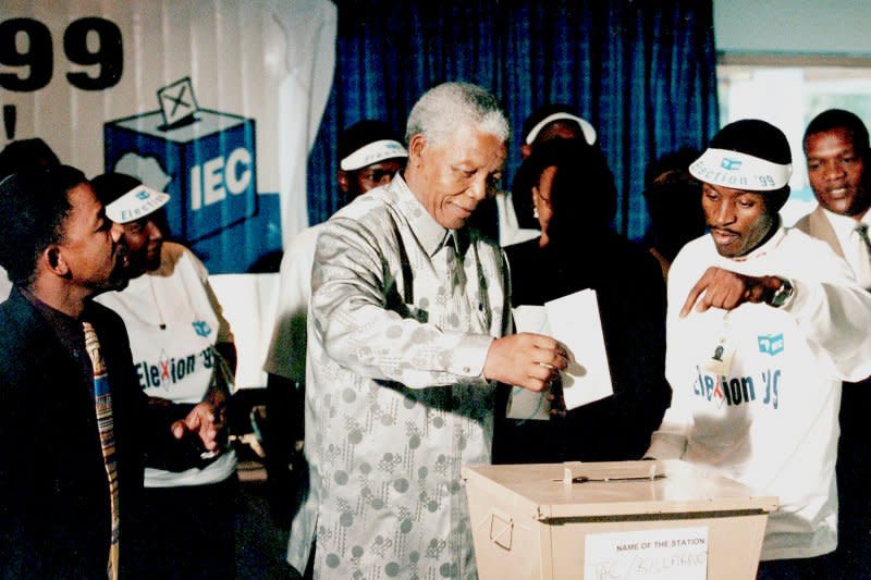 President Nelson Mandela casts his vote in the second all-race democratic elections in Johannesburg, South Africa, June 2 1999. On March 17, 1992, South African whites, by a margin of 68.7 percent to 31.2 percent, voted to end minority rule. File Photo by Debbie Yazbek/UPI