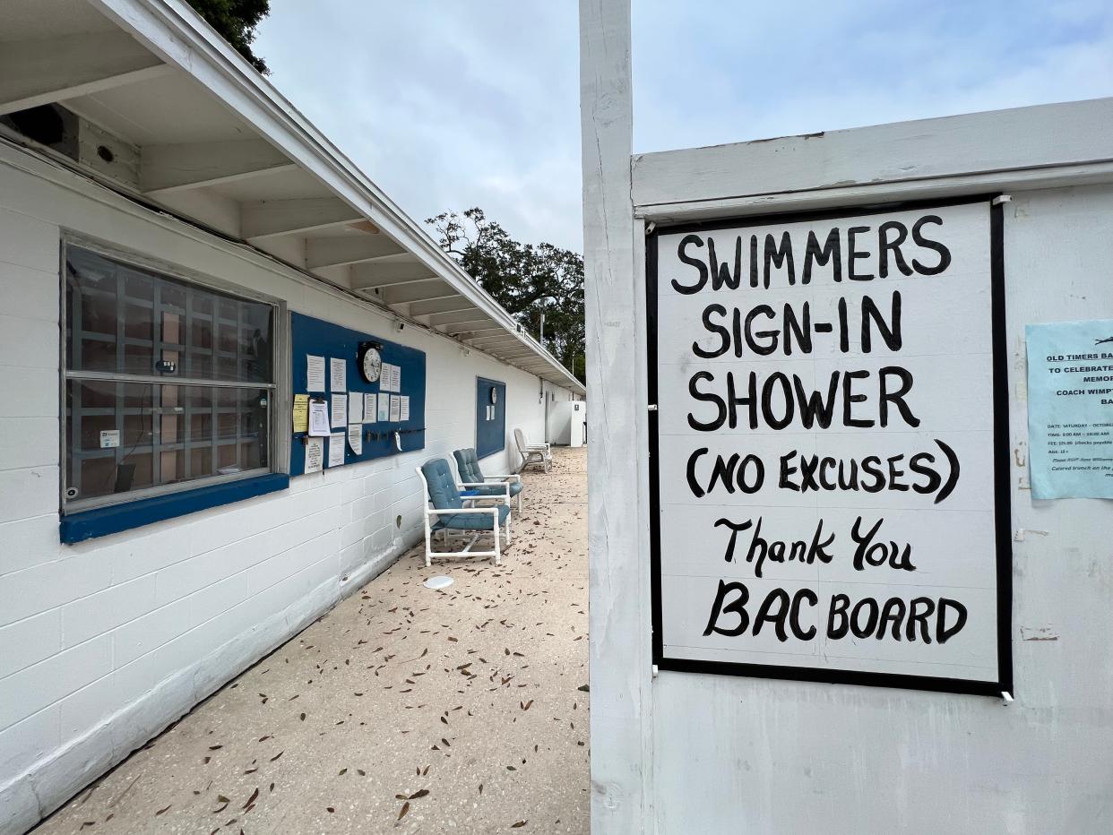 A sign at the entrance of the Beaches Aquatic Center provides the simple rules: "Swimmers, sign in, shower. No excuses."