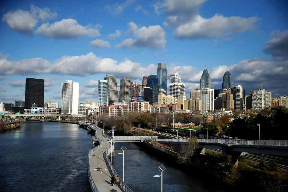 Clouds pass over the Schuylkill River and city skyline on Thursday, Dec. 3, 2015, in Philadelphia.