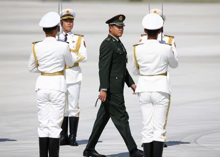 Honour guards stand at attention before the arrival of U.S. President Barack Obama (not pictured) at Hangzhou Xiaoshan international airport before the G20 Summit in Hangzhou, Zhejiang province, China September 3, 2016. REUTERS/Damir Sagolj