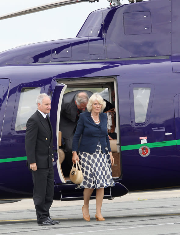 VALLEY, UNITED KINGDOM - JULY 09:  Camilla, Duchess of Cornwall arrives by helicopter for a private visit at RAF Valley on July 9, 2012 in Valley, United Kingdom.  (Photo by Chris Jackson - WPA Pool /Getty Images)