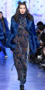 <p>Hadid mixed velvet and fur in bright hues for Anna Sui, following her big sis down the runway.</p>
