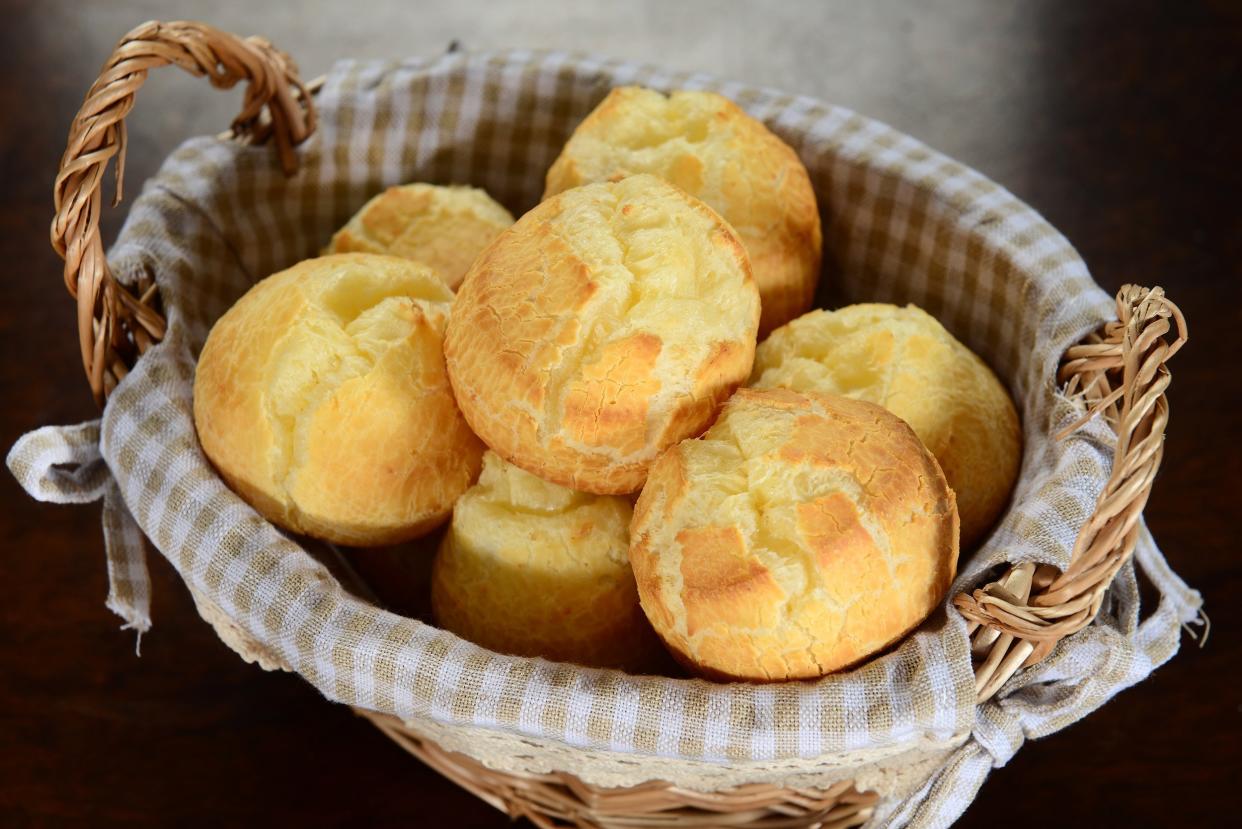 dinner rolls in a woven wicker basket