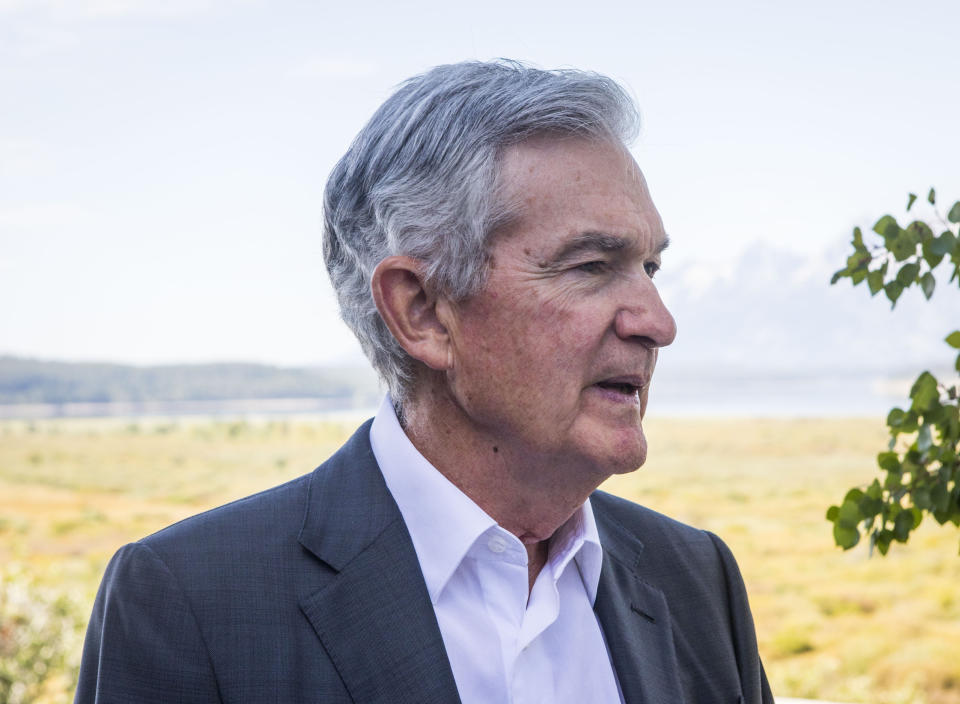 Federal Reserve Chairman Jerome Powell takes a break outside of Jackson Lake Lodge during the Jackson Hole Economic Symposium near Moran in Grand Teton National Park, Wyo., Friday, Aug. 25, 2023. (AP Photo/Amber Baesler)