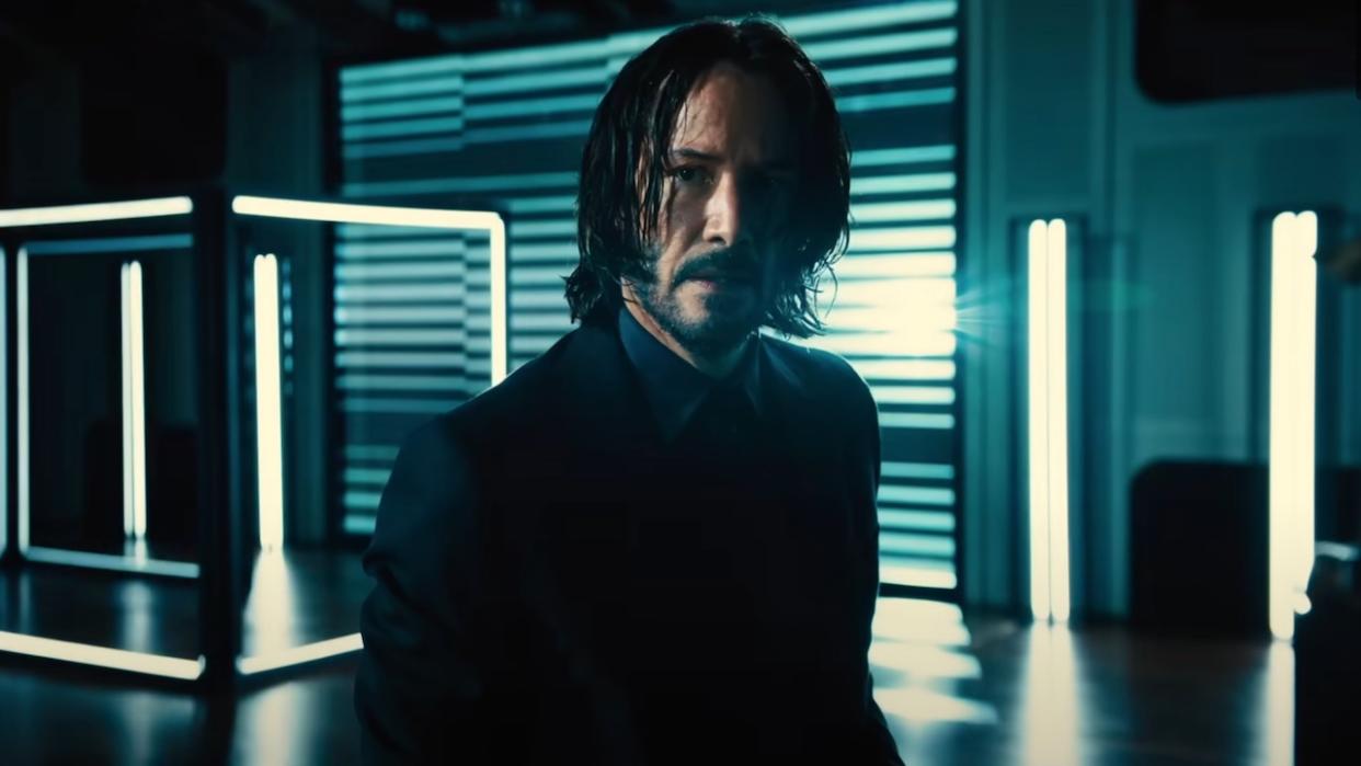  Keanu Reeves in the middle of a fight in John Wick: Chapter 4 