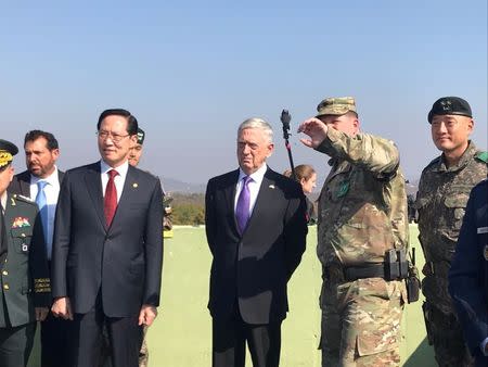 U.S. Defense Secretary Jim Mattis and his South Korean counterpart Song Young-moo peer into North Korea from Observation Post Ouellette in the demilitarized zone separating North and South Korea October 27, 2017. REUTERS/Phil Stewart