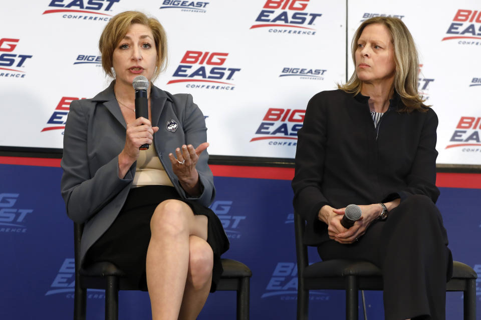 Susan Herbst, left, President, University of Connecticut, and Big East Commissioner Val Ackerman, speak during the announcement that the University of Connecticut is re-joining the Big East Conference, at New York's Madison Square Garden, Thursday, June 27, 2019. UConn is coming home as the Huskies are officially introduced again as a member of the Big East Conference. (AP Photo/Richard Drew)