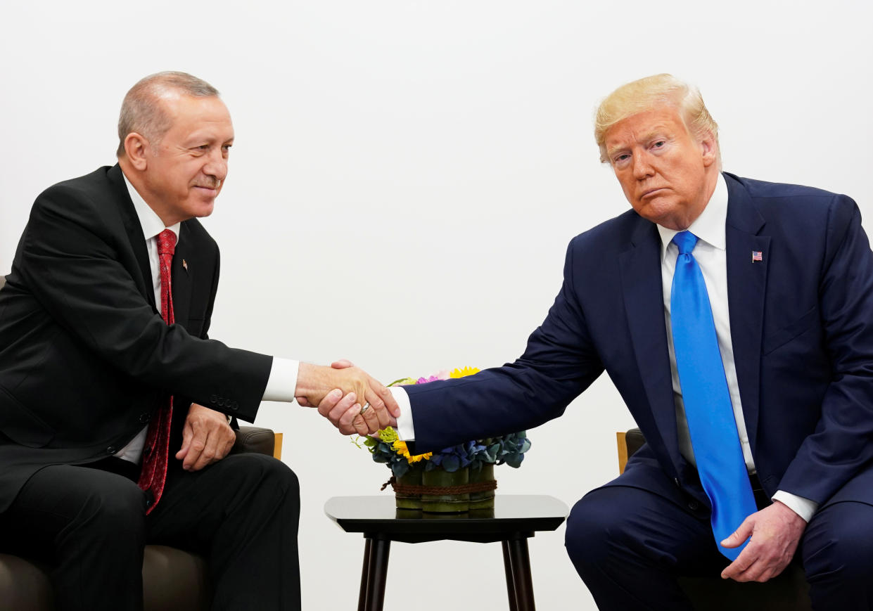 Turkish President Recep Tayyip Erdogan shakes hands with President Trump during a meeting at the G-20 summit in Osaka, Japan, in June. (Photo: Kevin Lamarque/Reuters)