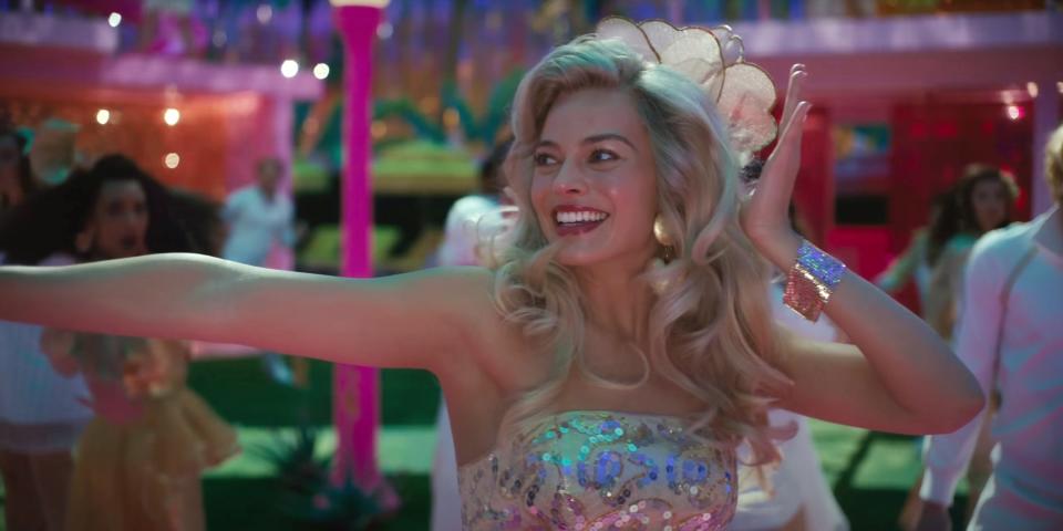 Margot Robbie dancing in a scene from "Barbie"