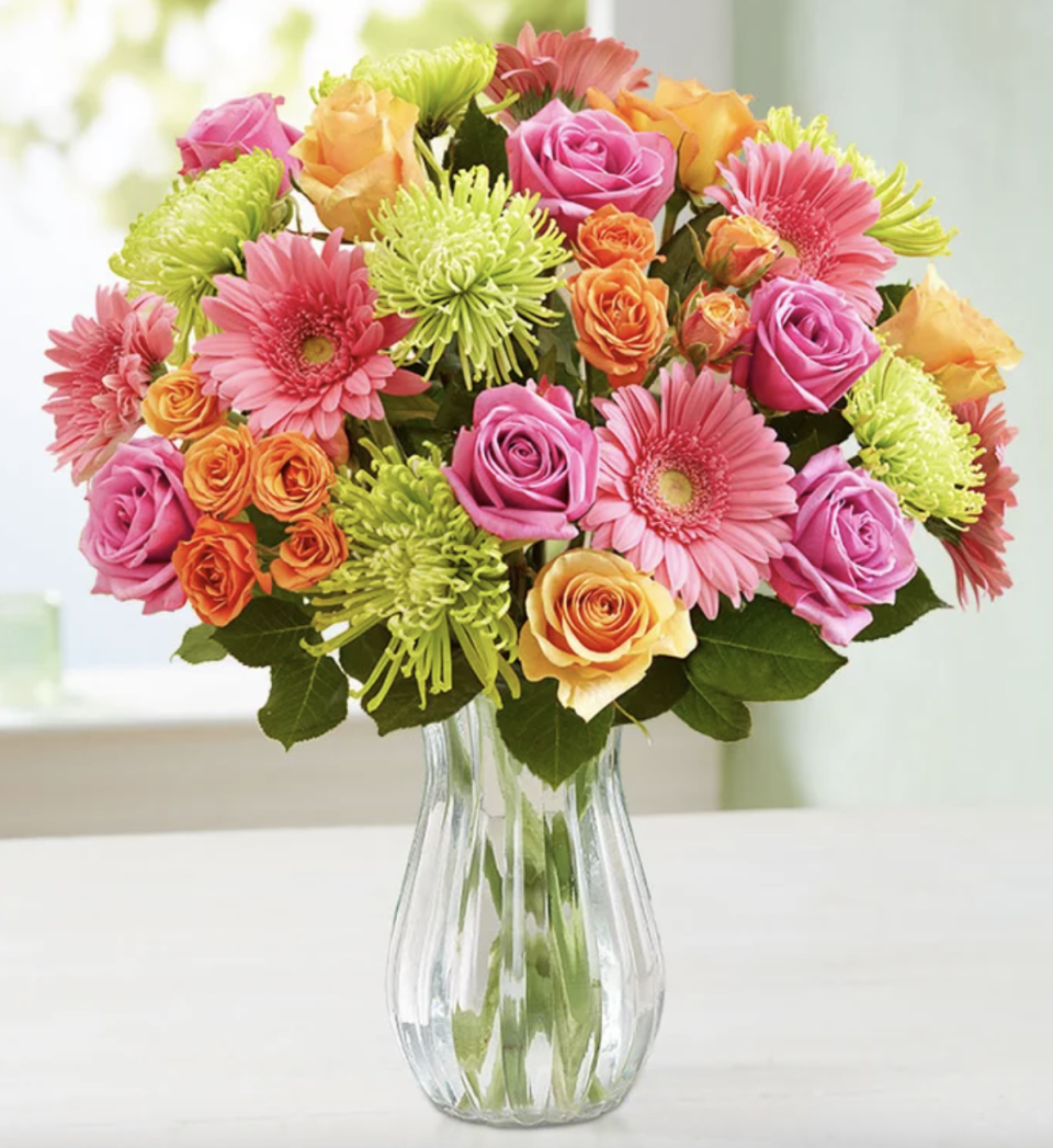 Vibrant Blooms in yellow, pink, orange flowers (Photo via 1-800-Flowers)