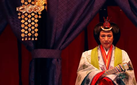 Empress Masako wore multi-layered coloured robes during the main ceremony - Credit: AFP