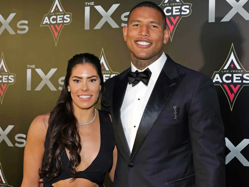 <p>Ethan Miller/Getty</p> Kelsey Plum and Darren Waller at the 2022 Inaugural IX Awards.