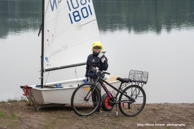 Koko Lee, 11, is an avid cyclist and sailor on a mission to honour the spirit of the whale that died in Montreal last year. (Photo by Jean-Marie Savard - image credit)