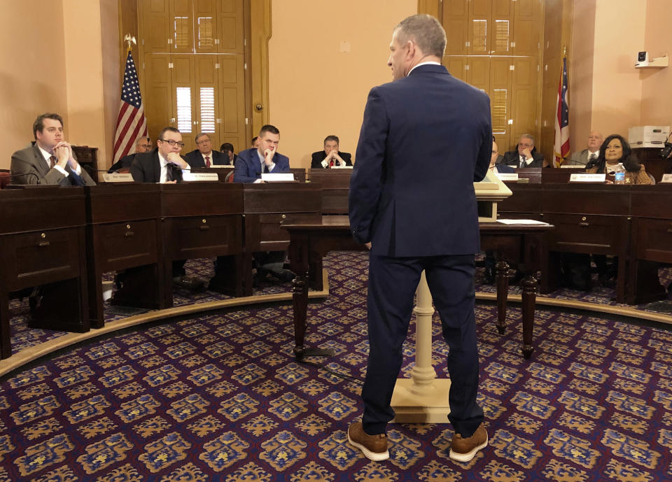 FILE - Adam DiSabato, a former Ohio State wrestling captain and brother to one of the early whistleblowers, testifies before Ohio lawmakers on Tuesday, Feb. 11, 2020, in Columbus, Ohio. Ohio State has since doled out tens of millions of dollars in settlements. (AP Photo/Kantele Franko, File)