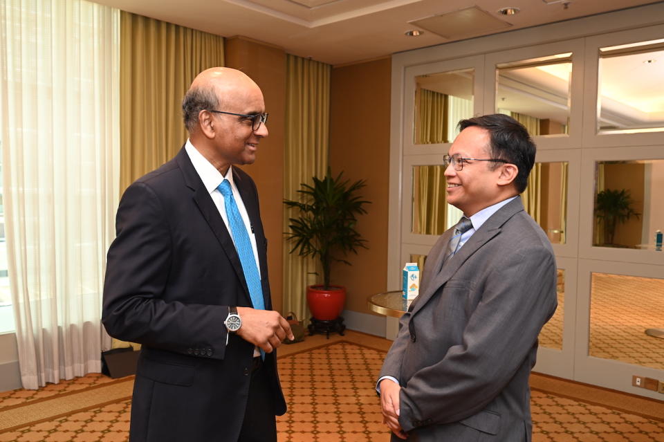 President Tharman Shanmugaratnam with Dr Shawn Vasoo, clinical director at the National Centre for Infectious Diseases. 