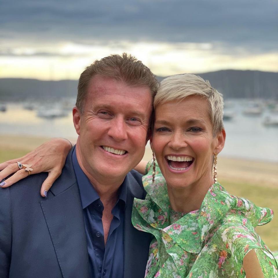 Jess Rowe with her husband, Nine News presenter Peter Overton pose for a selfie on a beach