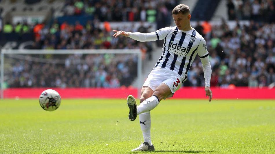 Conor Townsend crosses the ball for West Bromwich Albion during a game