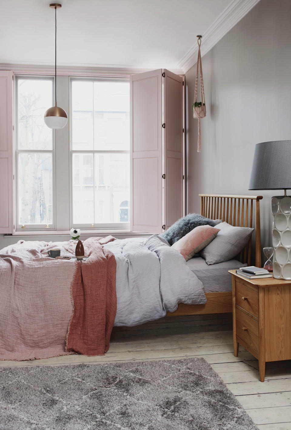 Add softness to a bedroom with blush hues