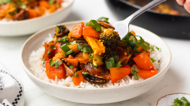 sweet and sour stir-fry veggies over rice